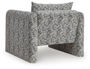 Ashley Furniture Kenbell Accent Chair with plush fabric upholstery and stylish design, shown from the back in this image.