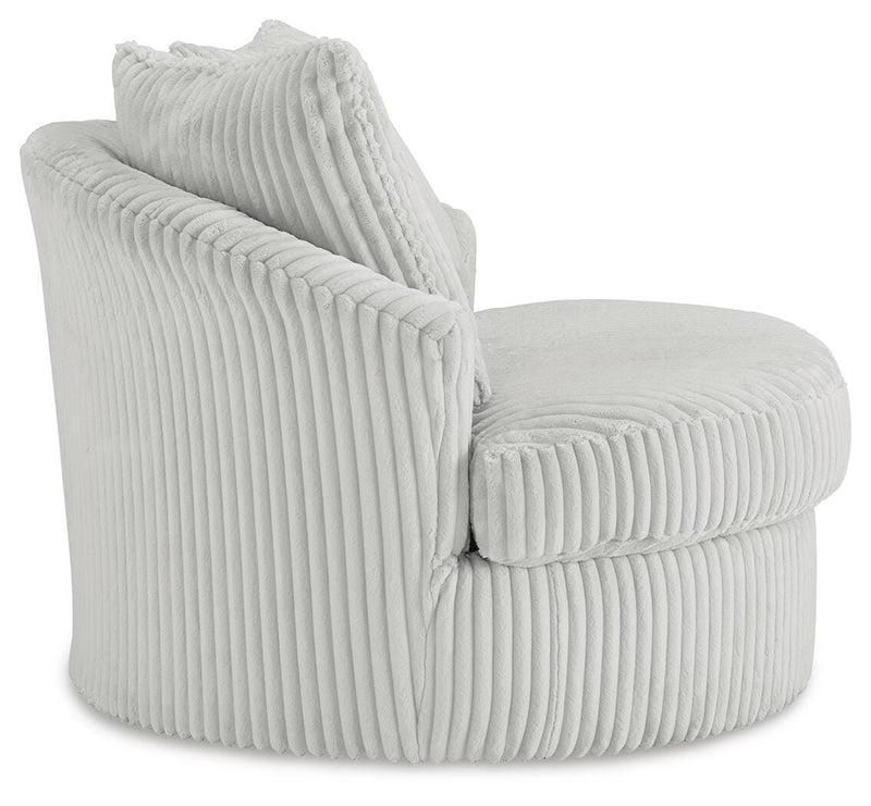 Ashley Furniture Gramwell swivel accent chair with plush upholstery and modern design, shown from a side view.