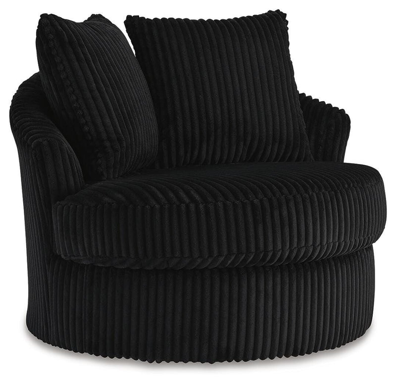 Ashley Furniture Gramwell swivel accent chair with plush upholstery and modern design, shown from an angled side view.