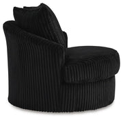 Ashley Furniture Gramwell swivel accent chair with plush upholstery and modern design, shown from a side angle.
