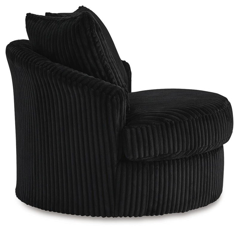 Ashley Furniture Gramwell swivel accent chair with plush upholstery and modern design, shown from a side angle.