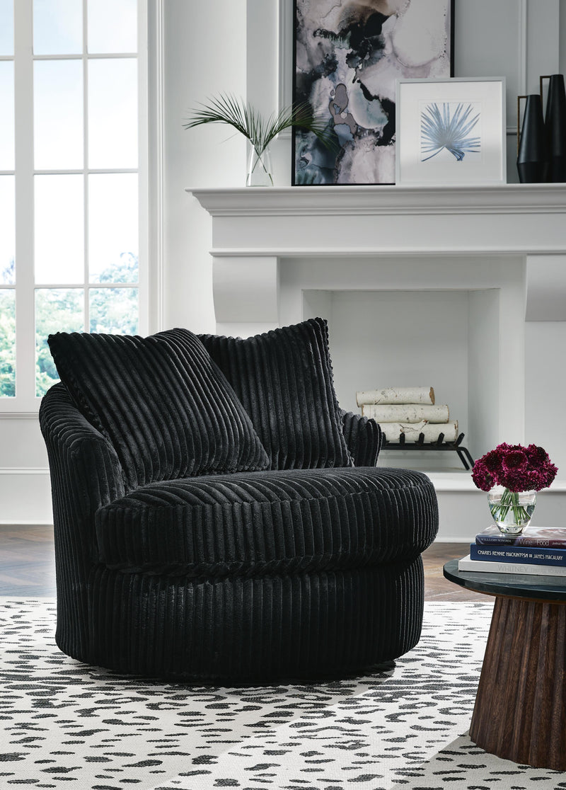 Ashley Furniture Gramwell swivel accent chair with plush upholstery and modern design, perfect for living room or lounge area.