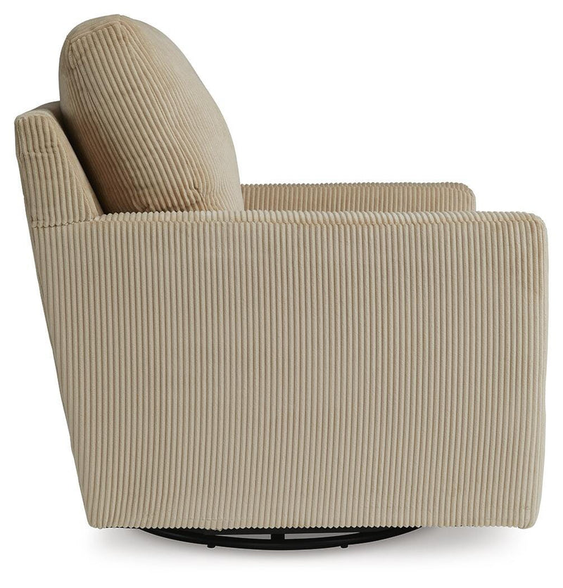 Ashley Furniture Icaman swivel accent chair with plush fabric, shown from the side, featuring a modern design and comfortable seating.