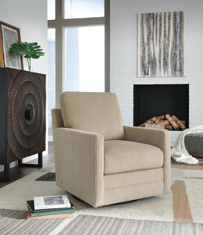 Ashley Furniture Icaman swivel accent chair with upholstered fabric and modern design, shown in a cozy living room setting.