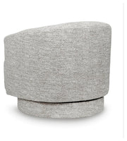 Ashley Furniture Wardsor Swivel Accent Chair with a plush fabric upholstery and a modern design, shown from the back.