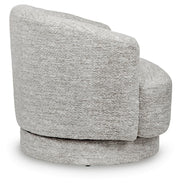 Ashley Furniture Wardsor Swivel Accent Chair with plush fabric and a modern design, shown from the side in a stylish living room setting.