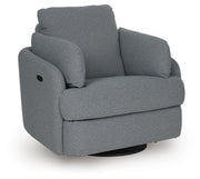 Ashley Furniture Alainmont Next-Gen Nuvella swivel accent chair with plush cushioning and modern design, shown from an angle.