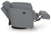 Ashley Furniture Alainmont Next-Gen Nuvella swivel power recliner accent chair, side view with open reclining mechanism.