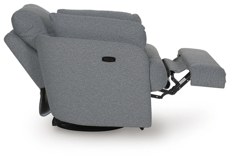 Ashley Furniture Alainmont Next-Gen Nuvella swivel power recliner accent chair, side view with open reclining mechanism.