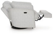 Ashley Furniture Alainmont Next-Gen Nuvella swivel accent recliner with side open mechanism, in a modern design.