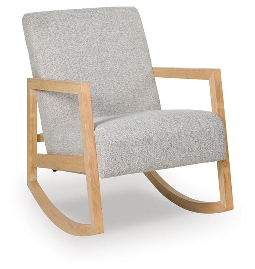 Ashley Furniture Wychworth accent chair with plush upholstery and wooden legs, shown from an angled side view.