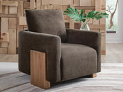 Ashley Furniture Dairlett Accent Chair with plush fabric upholstery and sleek wooden legs, stylish addition to any living room.