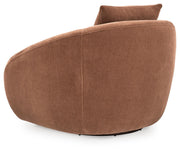 Ashley Furniture Yahya swivel accent chair with plush fabric and modern design, shown from the back in a cozy living room setting.