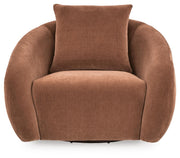 Ashley Furniture Yahya swivel accent chair with plush fabric upholstery and modern design, shown from a head-on angle.