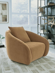 Ashley Furniture Yahya swivel accent chair with plush fabric upholstery and modern design, shown in a cozy living room setting.