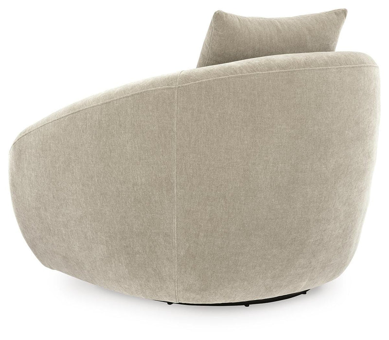 Ashley Furniture Yahya swivel accent chair with plush fabric and modern design, shown from the back with a round swivel base.