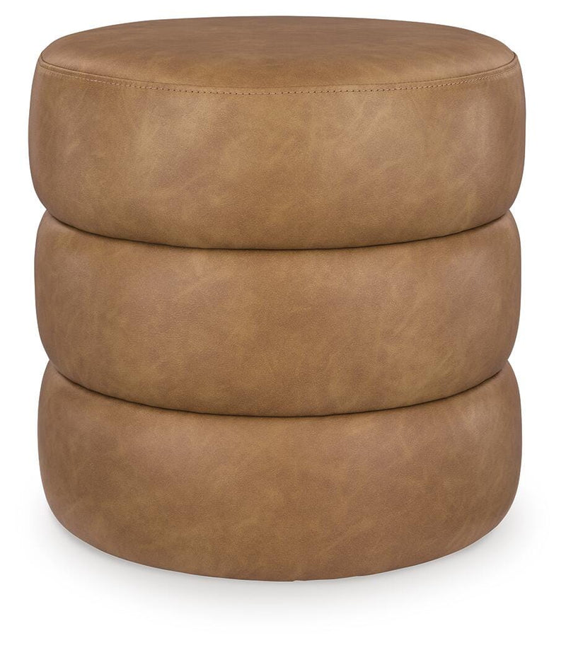 Ashley Furniture Ummi Swivel Accent Ottoman with plush fabric and modern design, perfect for living room or seating area.