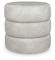 Ashley Furniture Ummi Swivel Accent Ottoman with padded fabric cushion and wooden base, perfect for living room decor.
