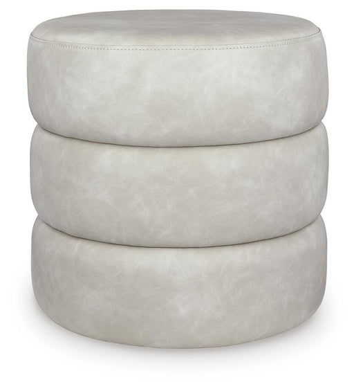 Ashley Furniture Ummi Swivel Accent Ottoman with padded fabric cushion and wooden base, perfect for living room decor.