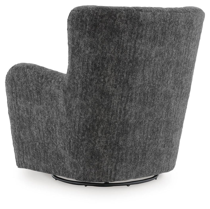 Ashley Furniture Rowenburg swivel glider accent chair with plush cushions and wooden legs, shown from the back in a cozy living space.