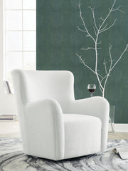 Ashley Furniture Rowenburg swivel glider accent chair with plush cushioning and wooden legs, ideal for cozy living spaces.
