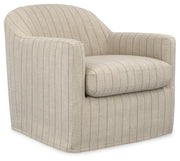 Ashley Furniture Valwick swivel accent chair with a modern design and plush upholstery, shown from an angled side view.