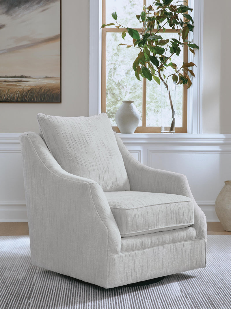 Ashley Furniture Gubbins swivel accent chair with plush upholstery and wooden legs, showcasing stylish and comfortable seating.