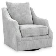 Ashley Furniture Gubbins swivel accent chair with a cozy, plush fabric and modern design, shown from a side angle.