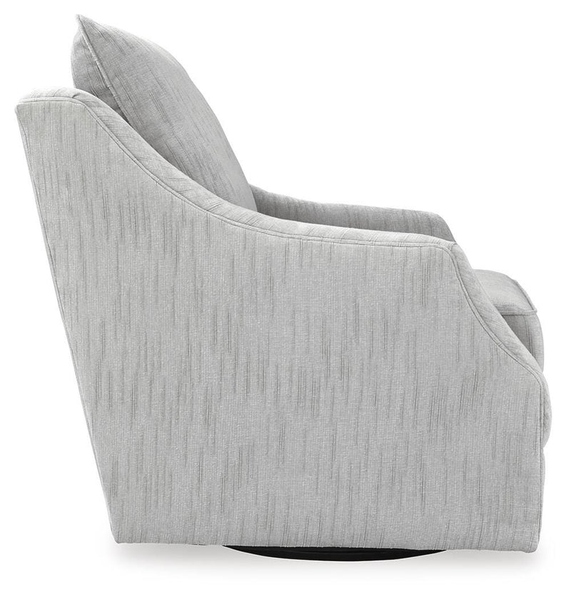 Ashley Furniture Gubbins swivel accent chair with a cozy, upholstered design and wooden base, shown from a side angle.