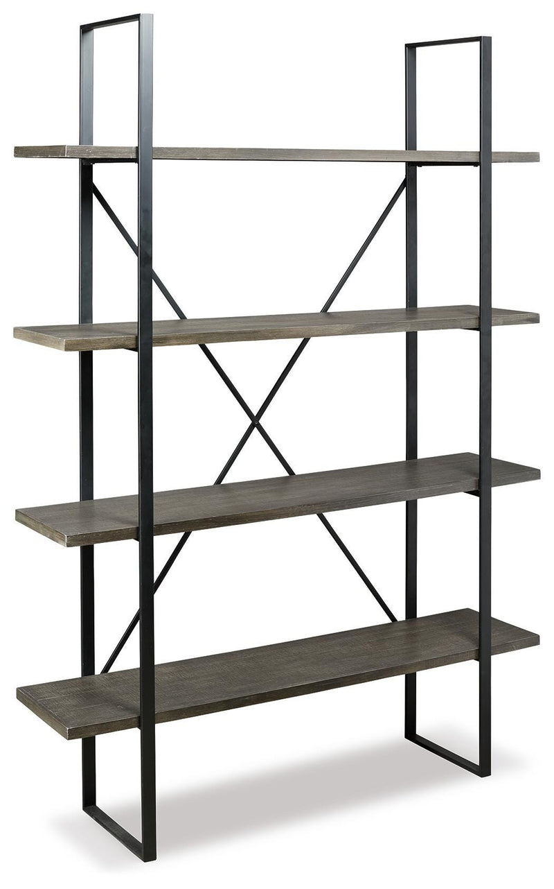 Ashley Furniture Gilesgrove Bookcase with open shelving and wood finish, shown from an angled side view.