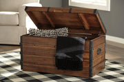 Open Kettleby Storage Trunk by Ashley Furniture showing spacious interior, wooden construction, and classic design.