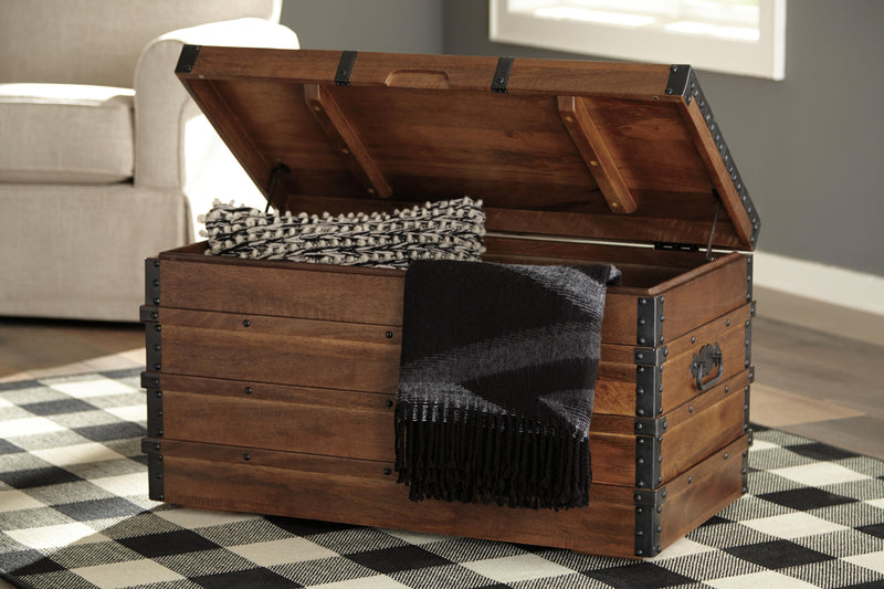 Open Kettleby Storage Trunk by Ashley Furniture showing spacious interior, wooden construction, and classic design.