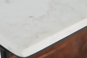 Close-up of Ashley Furniture Etanbury Accent Table top with detailed wood finish and elegant design.