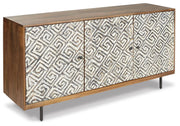Ashley Furniture Kerrings accent cabinet with wooden finish and sleek design, shown from an angled side view.