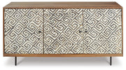 Ashley Furniture Kerrings Accent Cabinet with wood finish and decorative hardware, shown from a front head-on view.
