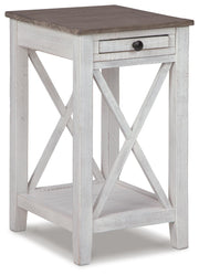 Ashley Furniture Adalane accent table with a round wooden top and sleek metal legs, ideal for living room decor.