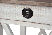 Ashley Furniture Adalane accent table with a sleek design, featuring a smooth wooden surface and modern metal legs.