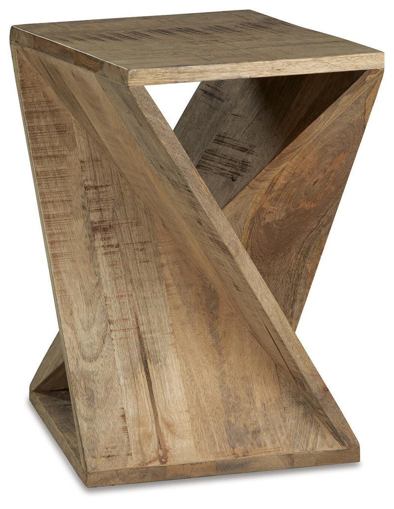 Ashley Furniture Zalemont accent table with a sleek round wooden top and black metal legs, shown from an angled side view.