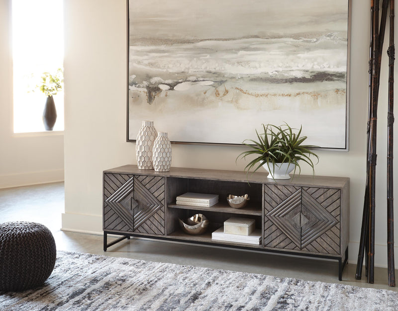 Ashley Furniture Treybrook Accent Cabinet with wooden finish and stylish design, featuring multiple storage compartments.