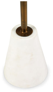 Ashley Furniture Caramont accent table with a wooden base and detailed design, shown in a close-up view.