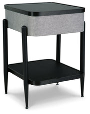 Ashley Furniture Jorvalee accent table with built-in speaker, featuring a sleek wooden surface and modern design.