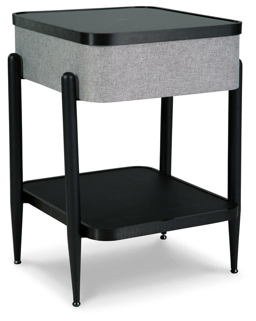 Ashley Furniture Jorvalee accent table with built-in speaker, featuring a sleek wooden surface and modern design.