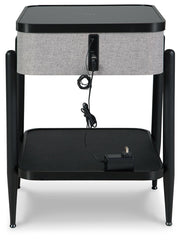 Ashley Furniture Jorvalee accent table with built-in speaker, featuring a wooden top and modern design for stylish home decor.