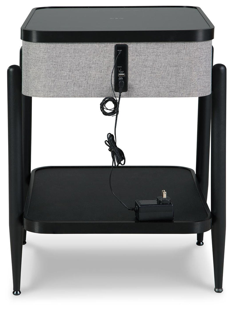 Ashley Furniture Jorvalee accent table with built-in speaker, featuring a wooden top and modern design for stylish home decor.