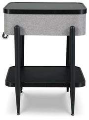Ashley Furniture Jorvalee accent table with built-in speaker, featuring a sleek wooden surface and modern design.