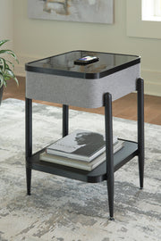 Ashley Furniture Jorvalee accent table with integrated speaker, wood finish, and modern design for living room decor.