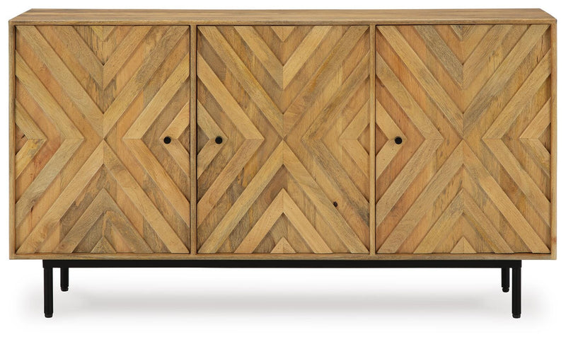 Ashley Furniture Cadewick accent cabinet with wood finish, featuring sleek doors and decorative hardware for stylish storage.