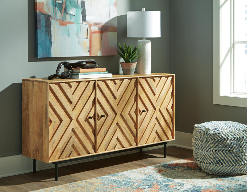 Ashley Furniture Cadewick accent cabinet with wooden doors and sleek design, ideal for stylish home storage.