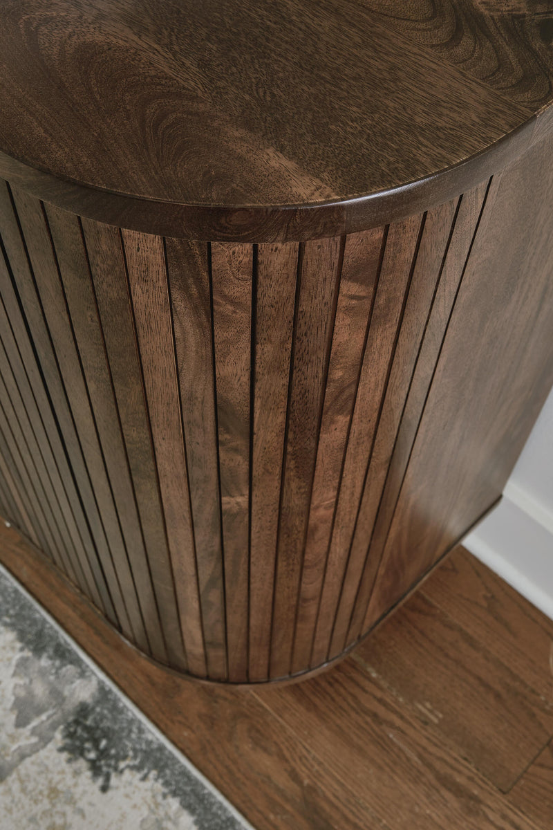 Ashley Furniture Amickly Accent Cabinet featuring wooden doors and a sleek design for stylish storage.