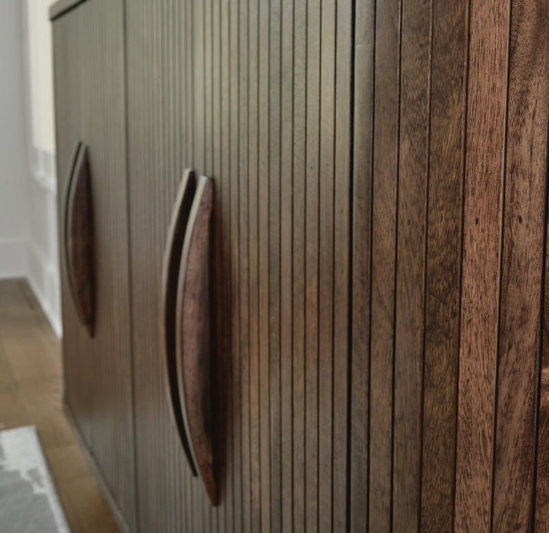 Ashley Furniture Amickly Accent Cabinet with detailed handle and elegant wood finish, showcasing stylish storage and decorative design.